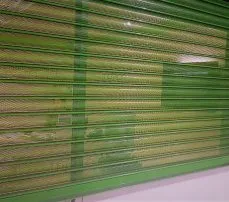 Perforated shutter in an office